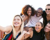 A group of men and women smiling for Seventh Sense