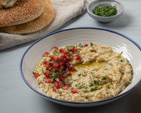 A bowl of hummus created using Med Cuisine products 