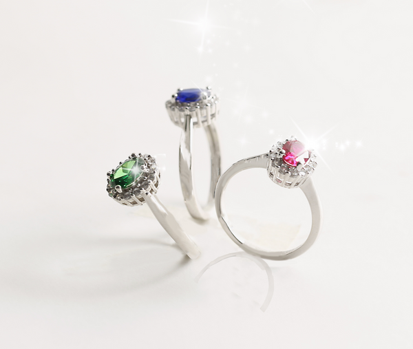 A trilogy of rings in silver with pink, green and blue stones from Real Effect