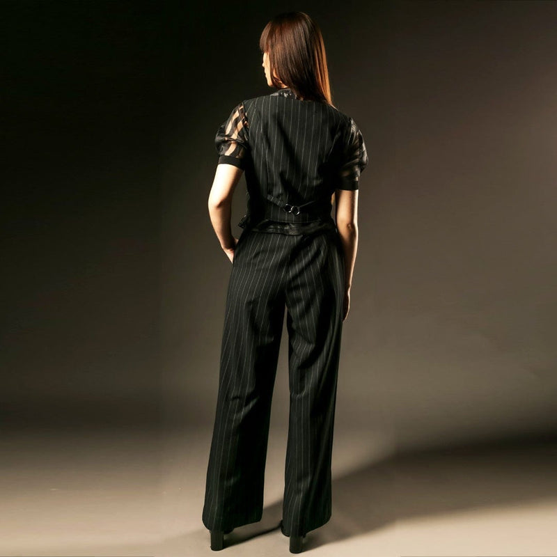 Suited trouser and suited crop top and black organza top back view.. Out of Sync.